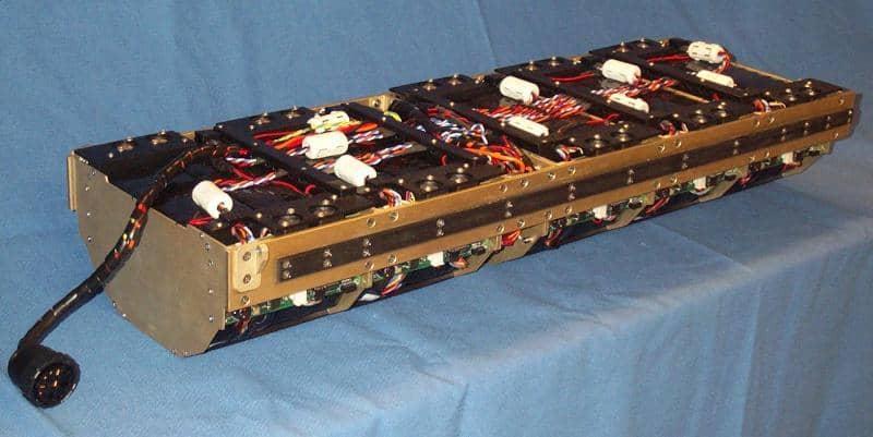 A semicircular tray of battery packs and wiring of a typical UAV