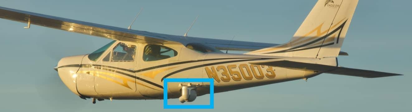 The Eagle Eye Camera Pod attached to the fuselage of a Cessna