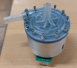 Prototype pump head with the components assembled on the drive unit