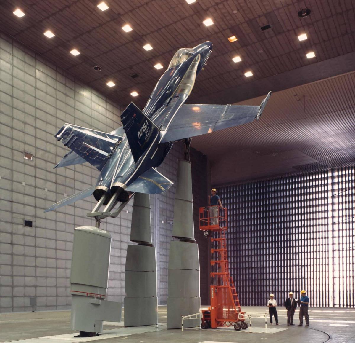 An F/A-18 Hornet fighter jet undergoing high angle of attack testing in a wind tunnel. CREDIT: www.nasa.gov