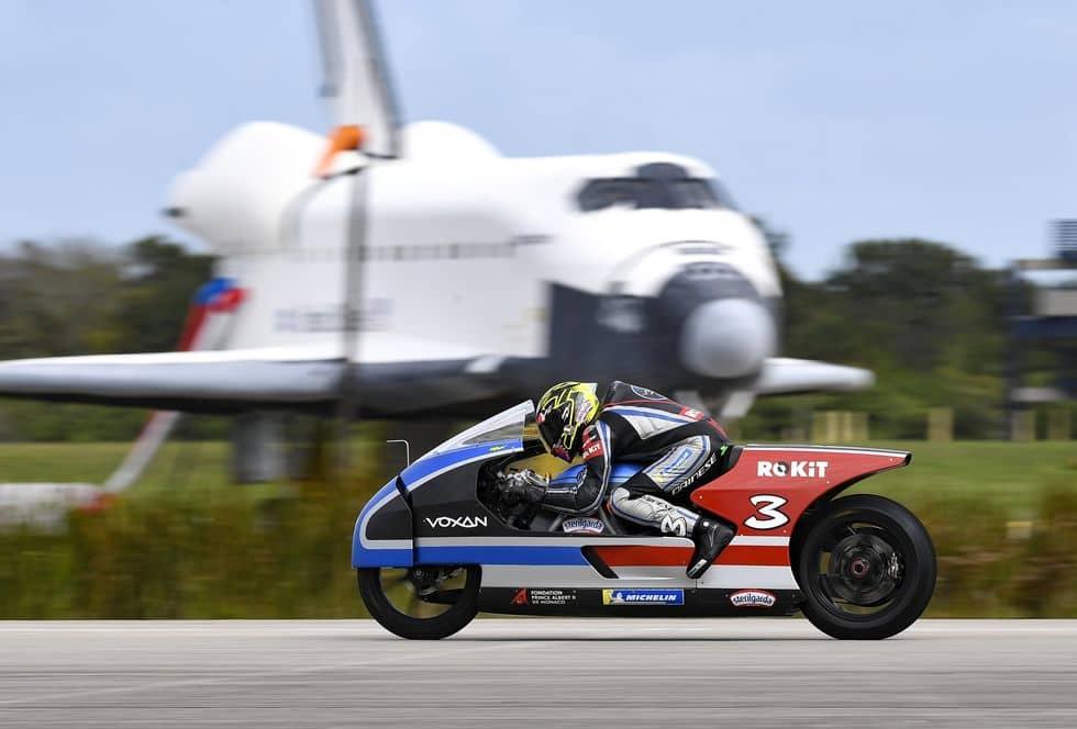 Max Biaggi riding the Voxan Wattman at an airfield