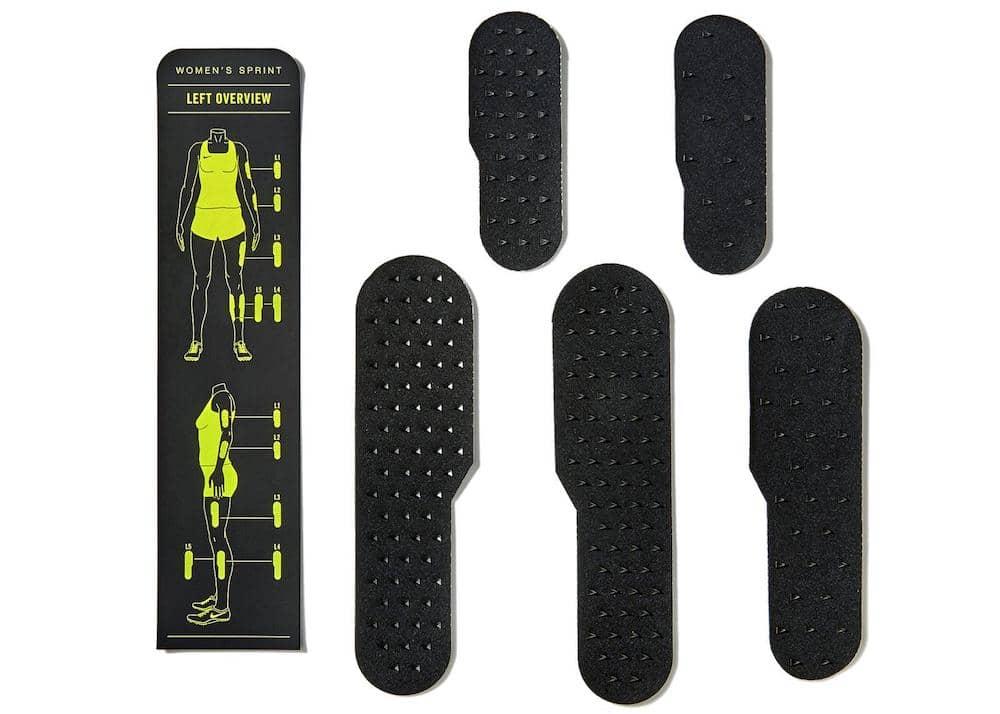Different sizes of black drag reduction panels that can be applied to runner's legs
